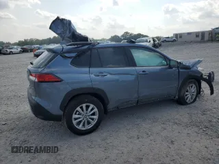 2023 Toyota Corolla Cross LE with VIN 7MUCAABG8PV066528, listed as a Copart auction lot 58902095 with 14,190 mi miles and Salvage title. Bid and sale history available at DreamBid. Image 3.