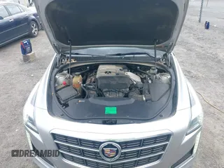 2014 Cadillac CTS Luxury AWD z VIN 1G6AX5SX2E0196881, wystawiony jako IAAI lot #41707633 z przebiegiem 169 168 mil mil oraz . Historia ofert i sprzedaży dostępna na DreamBid. Obrazek 10.