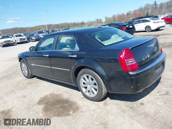 2006 Chrysler 300 C with VIN 2C3LA63H96H490736, listed as a IAAI auction lot 41998112 with 184,090 mi miles. Bid and sale history available at carsss.com. Image 3.