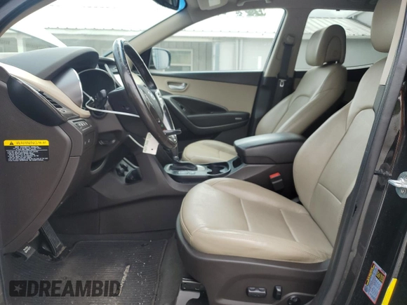2017 Hyundai Santa Fe 2.4L with VIN 5NMZU3LB7HH052263, listed as a Copart auction lot 57065895 with 117,488 mi miles and Salvage title. Bid and sale history available at DreamBid. Image 7.