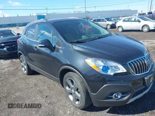 2014 Buick Encore Convenience with VIN KL4CJBSBXEB749396, listed as a IAAI auction lot 41860171 with 52,644 mi miles and . Bid and sale history available at DreamBid. Image 6.