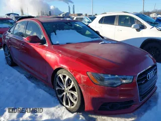 2013 Audi A6 3.0T Prestige with VIN WAUJGAFC5DN030463, listed as a IAAI auction lot 41304345 with 134,216 mi miles. Bid and sale history available at carsss.com. Image 1.