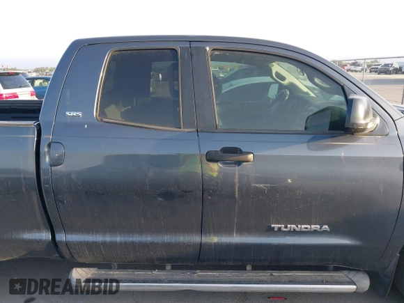 2007 Toyota Tundra SR5 with VIN 5TFRT54117X006566, listed as a IAAI auction lot 42074633 with 277,024 mi miles and . Bid and sale history available at DreamBid. Image 13.