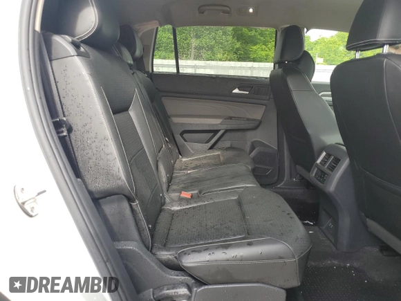 2023 Volkswagen Atlas SE with VIN 1V2KR2CA2PC524739, listed as a Copart auction lot 56976715 with 58,736 mi miles and Salvage title. Bid and sale history available at DreamBid. Image 10.