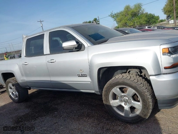 2017 Chevrolet Silverado 1500 LT with VIN 3GCUKREC2HG392487, listed as a IAAI auction lot 41807394 with 113,041 mi miles. Bid and sale history available at carsss.com. Image 14.