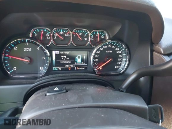 2015 Chevrolet Tahoe LT with VIN 1GNSCBKCXFR552071, listed as a IAAI auction lot 41972157 with 214,738 mi miles and . Bid and sale history available at DreamBid. Image 7.