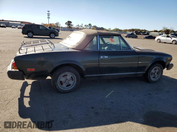 1979 FIAT 124 Spider z VIN 124CS20151060, wystawiony jako Copart lot #78019714 z przebiegiem 95 504 mil mil oraz Czysty tytuł • Clean title. Historia ofert i sprzedaży dostępna na DreamBid. Obrazek 3.