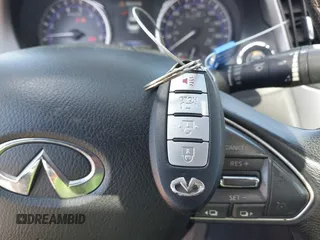 2015 Infiniti Q50 Premium z VIN JN1BV7AP1FM346254, wystawiony jako IAAI lot #42147947 z przebiegiem 147 737 mil mil oraz . Historia ofert i sprzedaży dostępna na DreamBid. Obrazek 11.