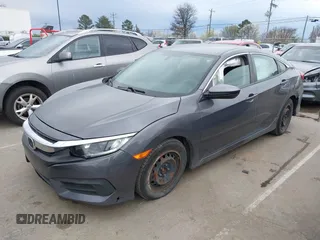 2017 Honda Civic LX with VIN 19XFC2F52HE233607, listed as a IAAI auction lot 41758632 with 159,290 mi miles and . Bid and sale history available at DreamBid. Image 2.