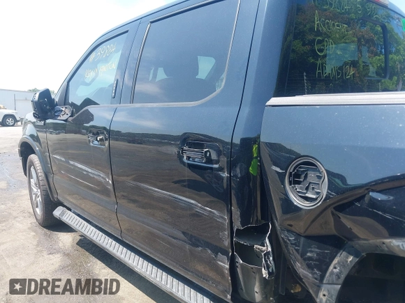 2018 Ford F-150 XL with VIN 1FTEW1EP2JFD51393, listed as a IAAI auction lot 42307408 with 141,478 mi miles and . Bid and sale history available at DreamBid. Image 14.