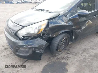 2014 Kia Rio LX with VIN KNADM5A33E6359792, listed as a IAAI auction lot 41911576 with 182,829 mi miles. Bid and sale history available at carsss.com. Image 6.