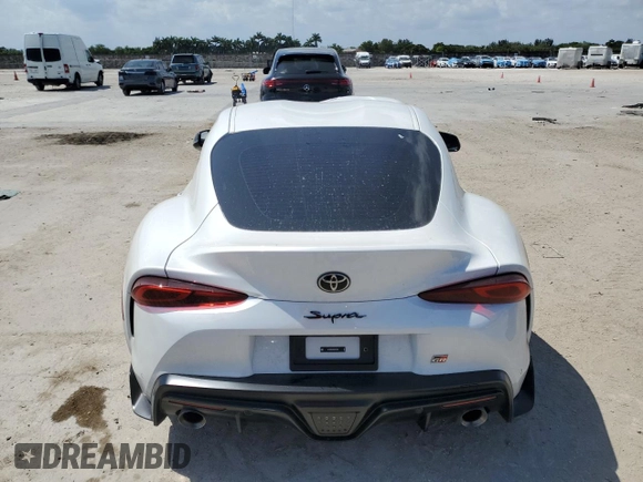 2025 Toyota GR Supra 3.0 with VIN WZ1DB0G09SW069188, listed as a Copart auction lot 49242215 with 0 mi miles and Salvage Title. Bid and sale history available at carsss.com. Image 6.