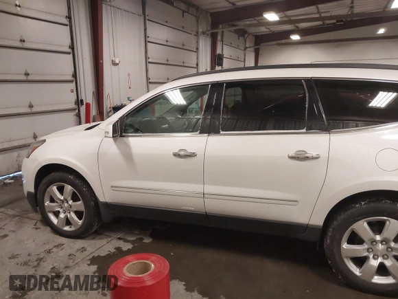 2017 Chevrolet Traverse Premier with VIN 1GNKVJKD9HJ340891, listed as a IAAI auction lot 41601595 with 96,647 mi miles and . Bid and sale history available at DreamBid. Image 14.