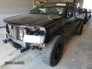 2010 GMC Canyon SLE1 with VIN 1GTJTCDE0A8101092, listed as a Copart auction lot 52311654 with 133,742 mi miles and Salvage title. Bid and sale history available at DreamBid. Image 1.