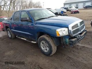 2006 Dodge Dakota SLT z VIN 1D7HW48K66S535495, wystawiony jako IAAI lot #41457268 z przebiegiem 254 686 mil mil oraz . Historia ofert i sprzedaży dostępna na DreamBid. Obrazek 1.