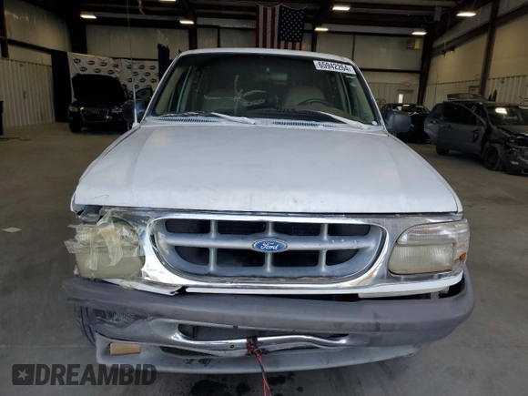 1996 Ford Explorer XL with VIN 1FMDU32X6TUD64045, listed as a Copart auction lot 65942264 with 138,750 mi miles and Salvage title. Bid and sale history available at DreamBid. Image 5.
