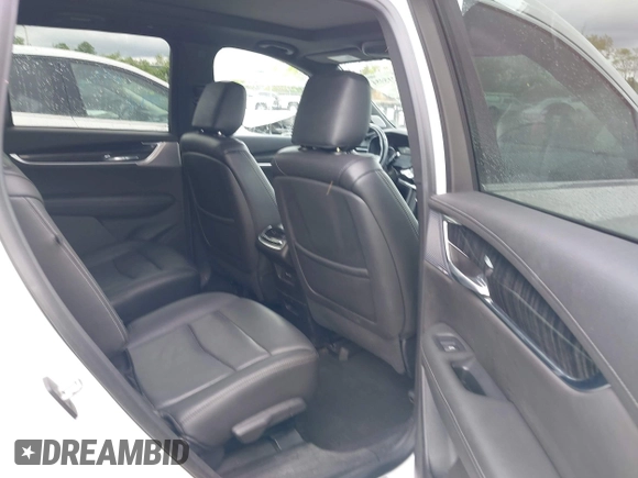 2021 Cadillac XT6 Premium Luxury z VIN 1GYKPDRS0MZ141453, wystawiony jako IAAI lot #42215954 z przebiegiem 144 245 mil mil oraz . Historia ofert i sprzedaży dostępna na DreamBid. Obrazek 8.