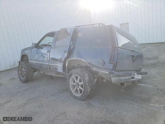 1999 Chevrolet Tahoe Z71 with VIN 1GNEK13R5XJ525230, listed as a Copart auction lot 76624504 with 204,489 mi miles and Salvage Title. Bid and sale history available at carsss.com. Image 2.