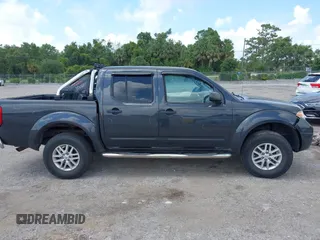 2014 Nissan Frontier SV z VIN 1N6AD0ER9EN751010, wystawiony jako IAAI lot #42326309 z przebiegiem 199 871 mil mil oraz . Historia ofert i sprzedaży dostępna na DreamBid. Obrazek 13.