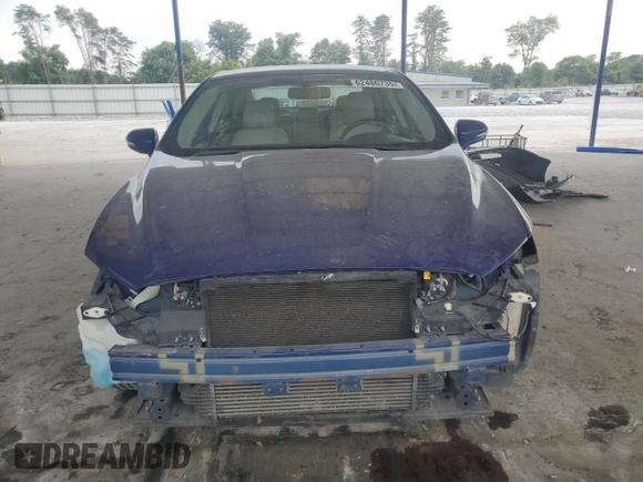 2016 Ford Fusion Titanium with VIN 3FA6P0K90GR344574, listed as a Copart auction lot 62486735 with 172,495 mi miles and Salvage title. Bid and sale history available at DreamBid. Image 5.