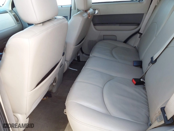 2010 Mercury Mariner Premier with VIN 4M2CN8HG7AKJ29786, listed as a IAAI auction lot 41323378 with 126,592 mi miles. Bid and sale history available at carsss.com. Image 8.