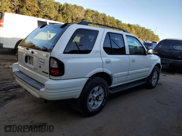 2000 Isuzu Rodeo S z VIN 4S2CK58W8Y4340907, wystawiony jako Copart lot #79683804 z przebiegiem 153 419 mil mil oraz Szkoda całkowita • Salvage title. Historia ofert i sprzedaży dostępna na DreamBid. Obrazek 3.