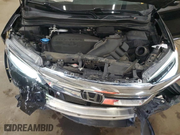 2019 Honda Pilot Touring 7-Passenger with VIN 5FNYF6H65KB092806, listed as a Copart auction lot 54205085 with 130,219 mi miles and Salvage title. Bid and sale history available at DreamBid. Image 12.