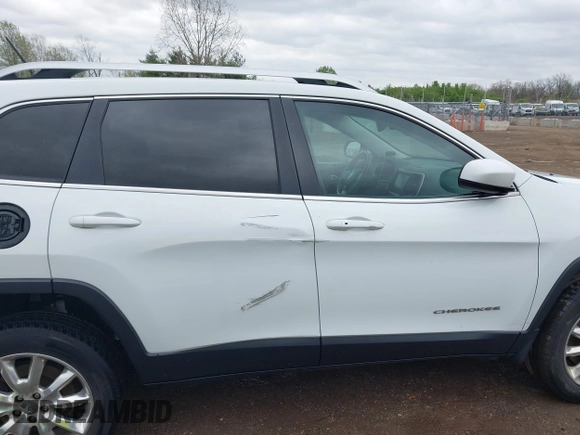 2014 Jeep Cherokee Limited with VIN 1C4PJMDB2EW281396, listed as a IAAI auction lot 42075036 with 113,578 mi miles and . Bid and sale history available at DreamBid. Image 13.