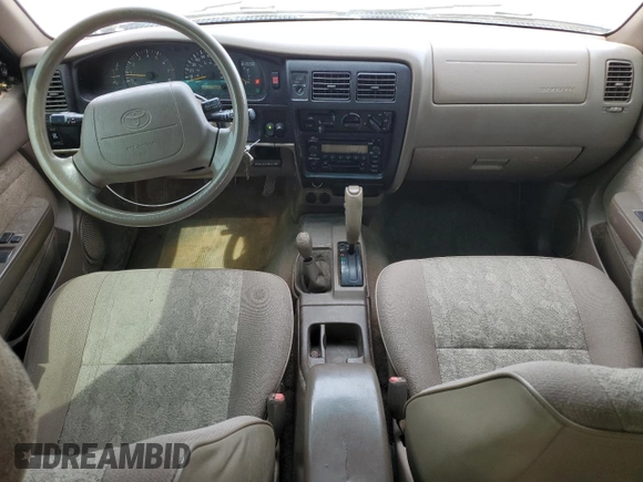 2000 Toyota Tacoma with VIN 4TAWN72N8YZ677345, listed as a Copart auction lot 61096865 with 217,590 mi miles and Clean title. Bid and sale history available at DreamBid. Image 8.