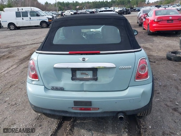 2013 MINI Cooper Convertible with VIN WMWZN3C53DT135427, listed as a IAAI auction lot 41954817 with 57,029 mi miles. Bid and sale history available at carsss.com. Image 17.