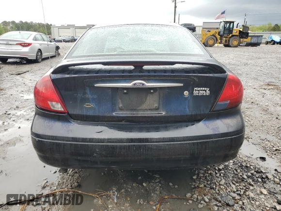 2003 Ford Taurus SEL Deluxe with VIN 1FAHP56S83A225002, listed as a Copart auction lot 49456975 with 199,759 mi miles and Salvage Title. Bid and sale history available at DreamBid. Image 6.