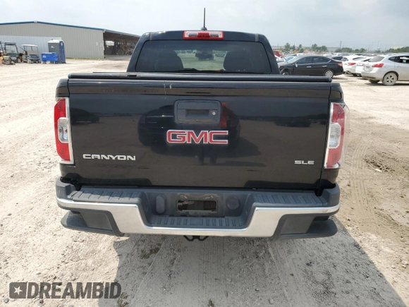 2016 GMC Canyon 2WD SLE with VIN 1GTG5CE32G1379575, listed as a Copart auction lot 56129894 with 77,430 mi miles and Clean Title. Bid and sale history available at carsss.com. Image 6.
