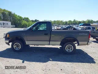 2003 Ford F-150 XL with VIN 1FTRF18243NB29920, listed as a IAAI auction lot 42037138 with 230,215 mi miles and . Bid and sale history available at DreamBid. Image 14.