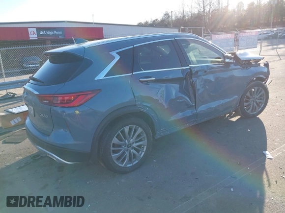 2023 Infiniti QX50 Luxe with VIN 3PCAJ5BA9PF109749, listed as a IAAI auction lot 41480886 with 31,157 mi miles and . Bid and sale history available at DreamBid. Image 4.