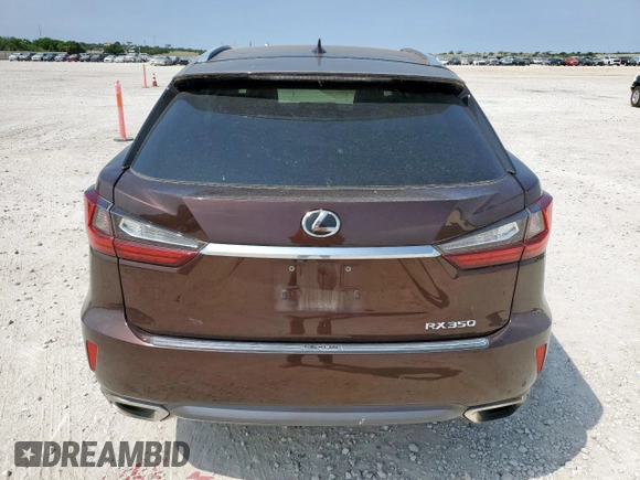 2017 Lexus RX 350 z VIN 2T2ZZMCA8HC077284, wystawiony jako Copart lot #57413725 z przebiegiem 70 616 mil mil oraz Czysty tytuł • Clean title. Historia ofert i sprzedaży dostępna na DreamBid. Obrazek 6.