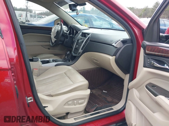 2012 Cadillac SRX Luxury Collection with VIN 3GYFNAE35CS634058, listed as a IAAI auction lot 41962999 with 169,066 mi miles and . Bid and sale history available at carsss.com. Image 5.