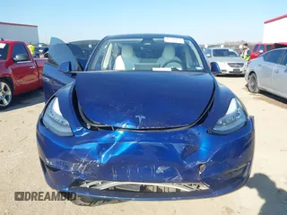 2021 Tesla Model Y Standard Range with VIN 5YJYGDED5MF121874, listed as a IAAI auction lot 41238170 with 72,041 mi miles and . Bid and sale history available at DreamBid. Image 12.