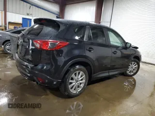 2016 Mazda CX-5 Touring with VIN JM3KE4CY0G0899611, listed as a Copart auction lot 52872915 with 76,801 mi miles and Salvage Title. Bid and sale history available at carsss.com. Image 3.