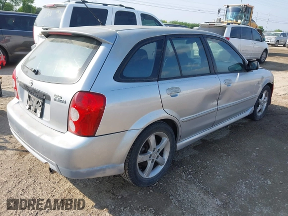 2003 Mazda Protege with VIN JM1BJ245031218333, listed as a IAAI auction lot 42070471 with 181,748 mi miles and . Bid and sale history available at DreamBid. Image 4.
