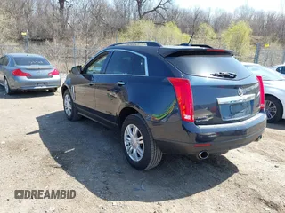 2015 Cadillac SRX with VIN 3GYFNAE39FS571065, listed as a IAAI auction lot 42029749 with 146,098 mi miles and . Bid and sale history available at DreamBid. Image 3.