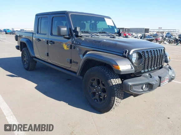 2021 Jeep Gladiator Willys с VIN 1C6HJTAG9ML546644, выставлен на аукционе IAAI как лот 41298101 с пробегом 40 099 миль миль и . История ставок и продаж доступна на DreamBid. Изображение 1.