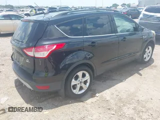 2013 Ford Escape SE with VIN 1FMCU9GX0DUC42483, listed as a IAAI auction lot 42549857 with 138,028 mi miles and . Bid and sale history available at DreamBid. Image 4.