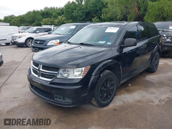 2013 Dodge Journey SE z VIN 3C4PDCAB6DT709917, wystawiony jako IAAI lot #42361943 z przebiegiem 196 891 mil mil oraz . Historia ofert i sprzedaży dostępna na DreamBid. Obrazek 2.