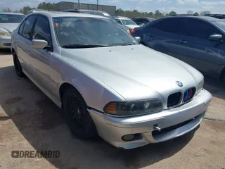 2003 BMW 5 Series 530iA with VIN WBADT63443CK38704, listed as a IAAI auction lot 41779122 with 103,198 mi miles. Bid and sale history available at carsss.com. Image 1.