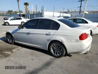 2010 BMW 3 Series 328i with VIN WBAPH5C52AA439642, listed as a Copart auction lot 42956485 with 82,960 mi miles and Salvage title. Bid and sale history available at DreamBid. Image 2.
