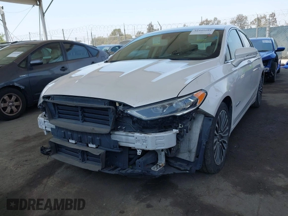 2017 Ford Fusion Hybrid Titanium with VIN 3FA6P0RU8HR229653, listed as a IAAI auction lot 42445182 with 163,279 mi miles and . Bid and sale history available at DreamBid. Image 2.