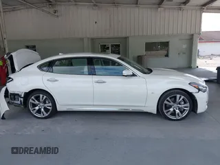 2018 Infiniti Q70 Luxe with VIN JN1BY1PP4JM330361, listed as a IAAI auction lot 42469866 with 69,986 mi miles and . Bid and sale history available at DreamBid. Image 13.