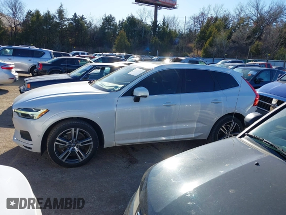 2018 Volvo XC60 Momentum with VIN YV4A22RK8J1004594, listed as a IAAI auction lot 41194134 with 82,771 mi miles and . Bid and sale history available at DreamBid. Image 14.