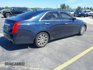 2016 Cadillac CTS RWD with VIN 1G6AP5SX8G0119984, listed as a IAAI auction lot 41679567 with 98,592 mi miles and . Bid and sale history available at DreamBid. Image 4.
