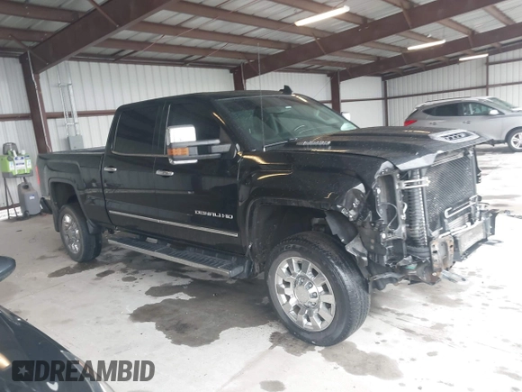 2017 GMC Sierra 2500HD Denali z VIN 1GT12UEY8HF222623, wystawiony jako IAAI lot #41985737 z przebiegiem 133 683 mil mil oraz . Historia ofert i sprzedaży dostępna na DreamBid. Obrazek 13.